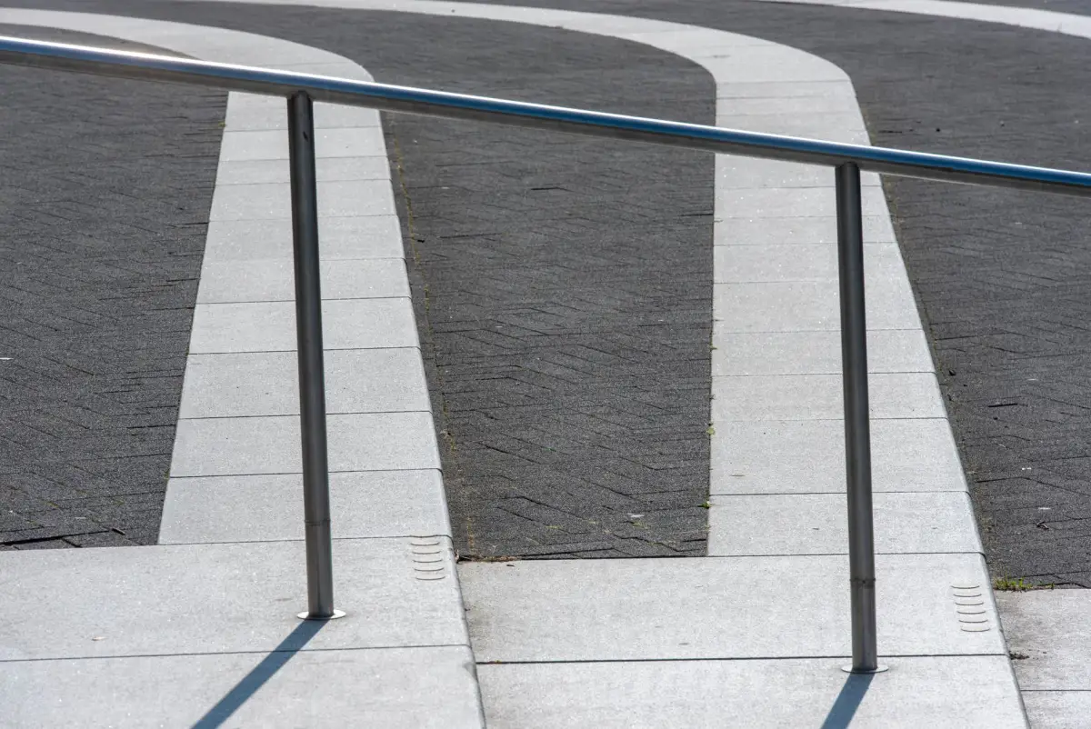Concrete ramp with handrails on both sides