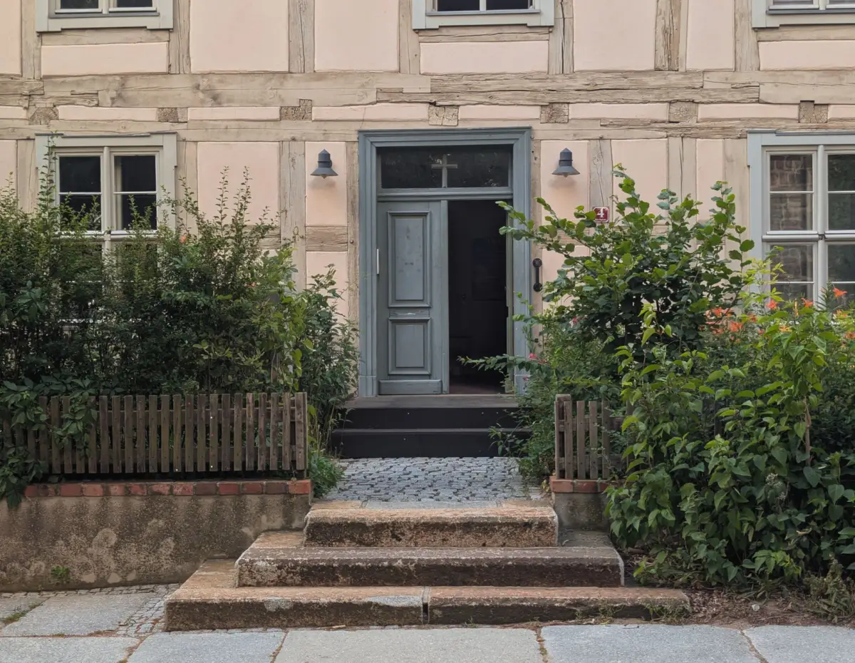 Concrete entrance steps at a townhouse doorway